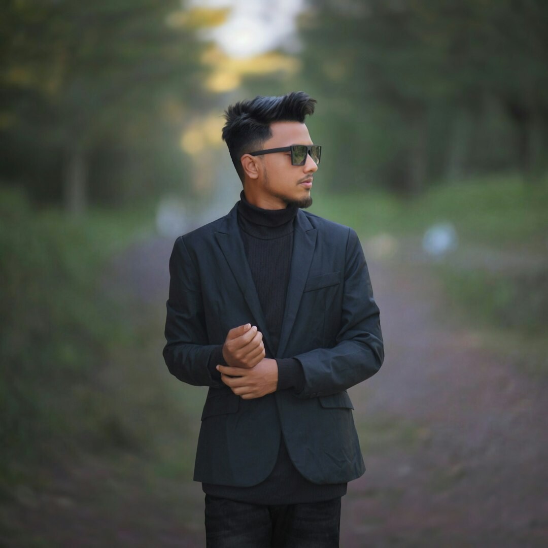 Portrait of a Belgian man in his 40s, founder and CEO, wearing a blazer
